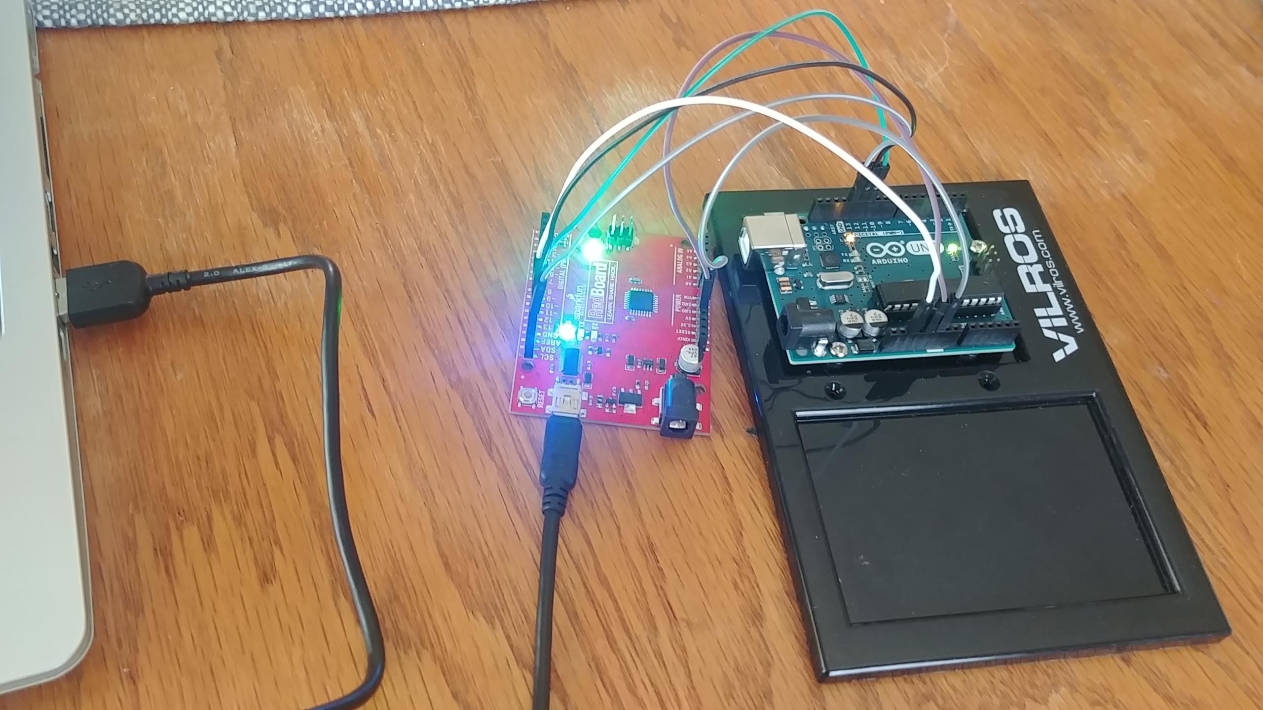 The newly made ISP redboard, connected directly to the Arduino Uno